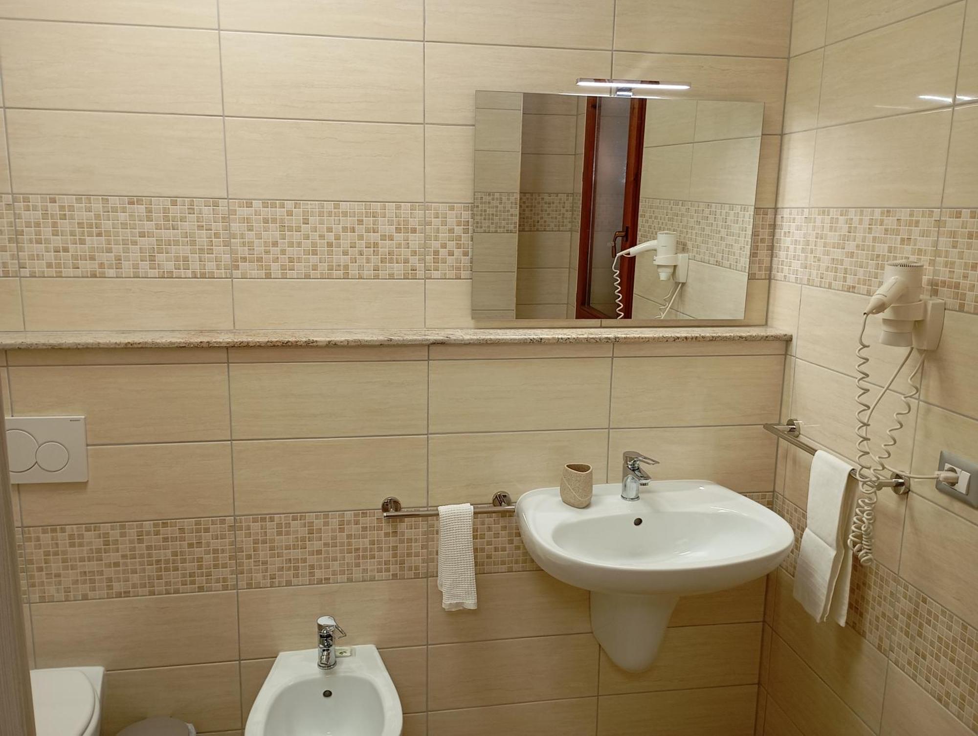 Hotel Meridiana Arbus Bagian luar foto