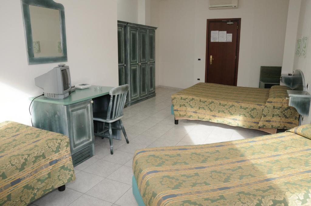 Hotel Meridiana Arbus Ruang foto